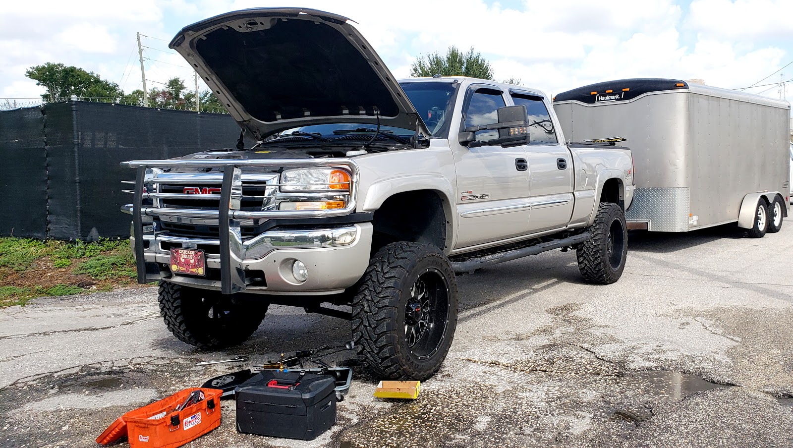 Large pickup truck being serviced on location